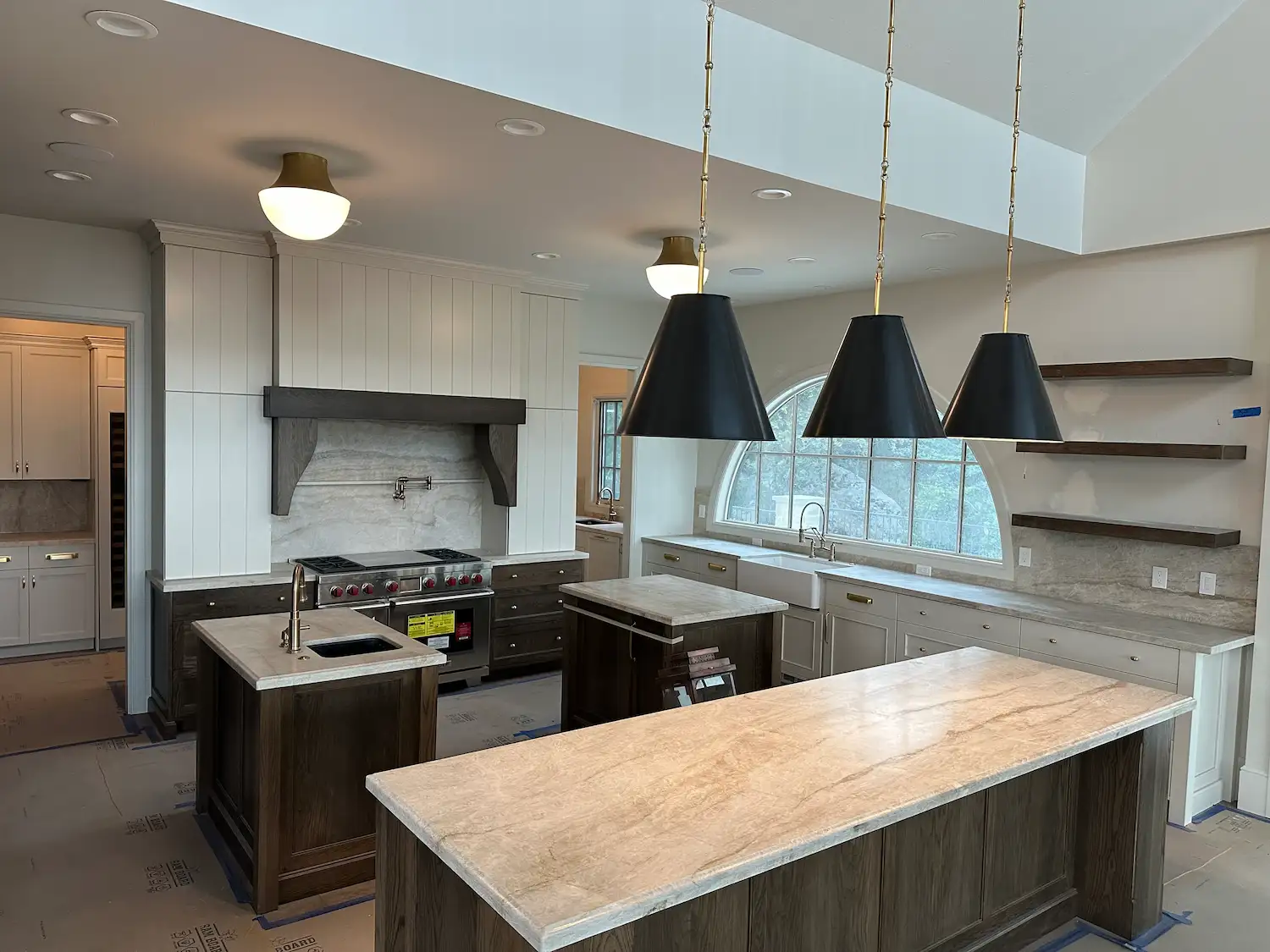 Marble kitchen island countertop with pendant lights